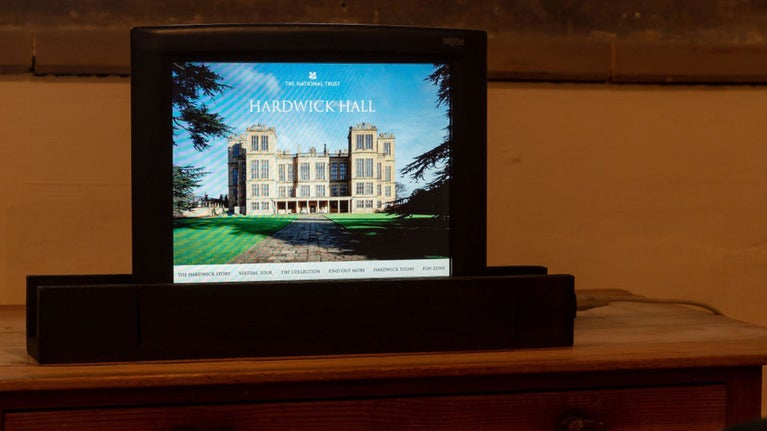 Image of the computer at Hardwick which offers the virtual tour in the Old Kitchens